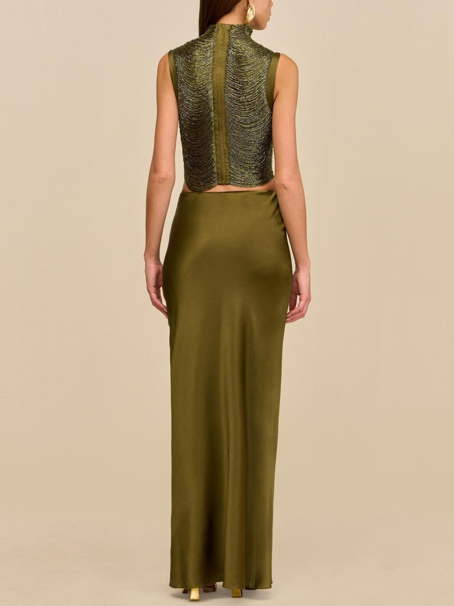Elegant Rosemary Ensemble: Sleeveless Fringe Top Paired with Flowing Satin Skirt
