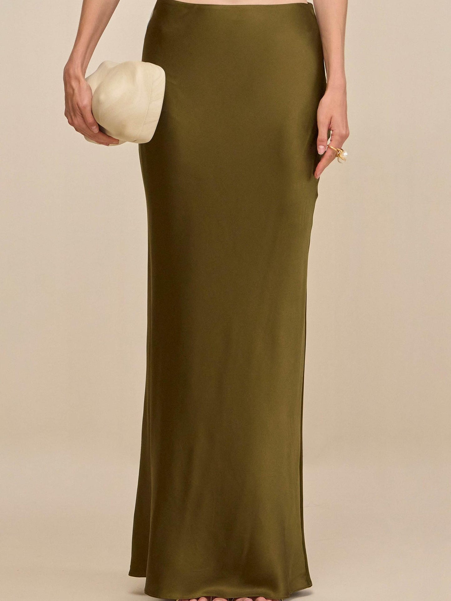 Elegant Rosemary Ensemble: Sleeveless Fringe Top Paired with Flowing Satin Skirt
